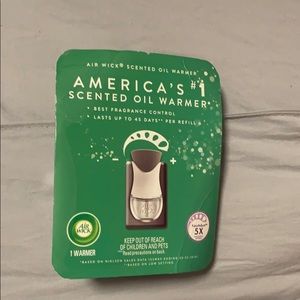 Two Air Wick Scented Oil Warmer